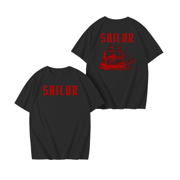 Discover the 'Sailor' drop-shoulder tee, perfect for those who love the sea. Oversized fit available in navy blue, white, and black. Make a nautical statement!